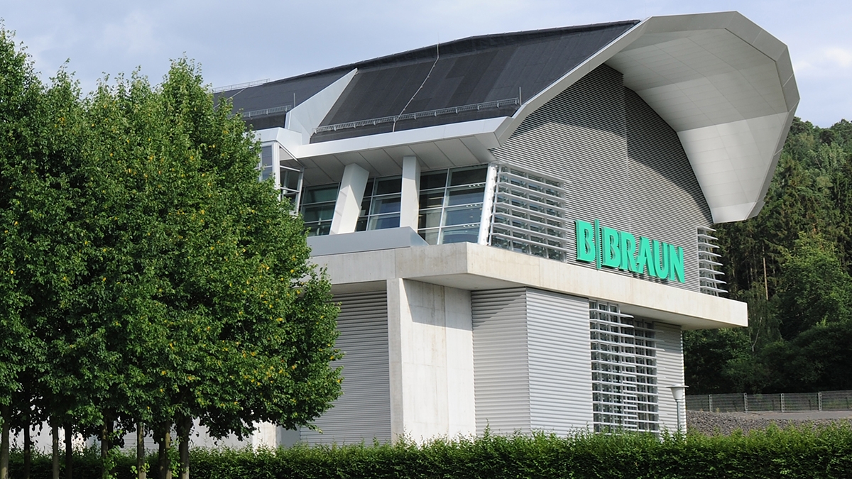 B. Braun visitor center building featuring a B. Braun big logo, radiating a sense of hospitality and openness to all who approach.