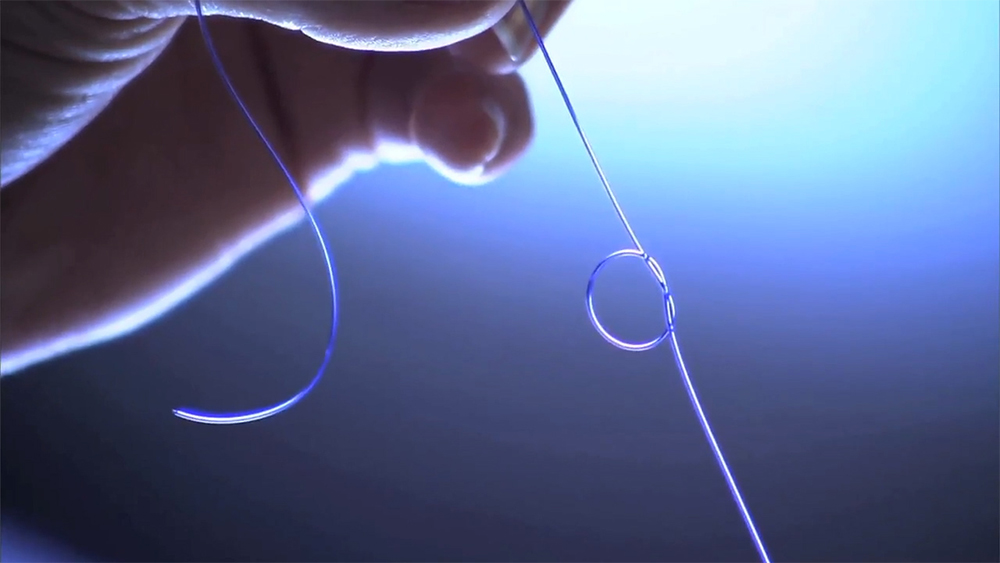 Monomax® surgical suture material held by one hand