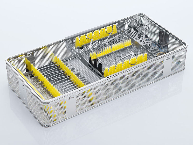 Sterile container tray with surgical instruments