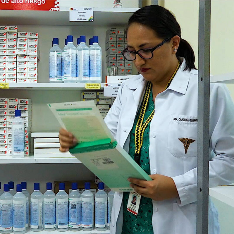Healthcare professional woman looking at Askina dressings