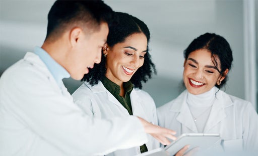 AdobeStock - health care workers exchange views