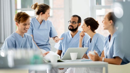 health care workers exchange views