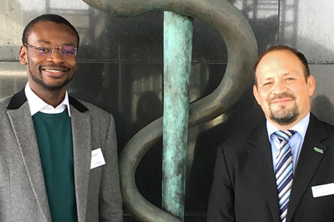 Dr. Uchenna Ajoku, 12th WFNS-Aesculap Pediatric Fellow & Harald Dreher, Business Manager Neurosurgery