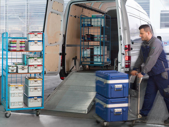 Male employee of the Aesculap Technical Service delivers the surgical equipment