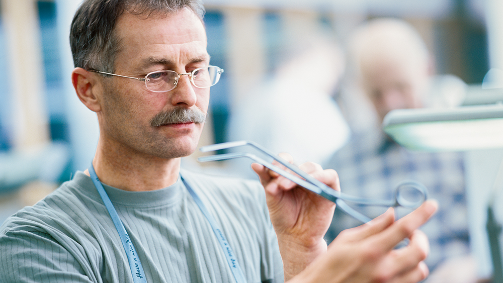 Technical service employee checks an instrument