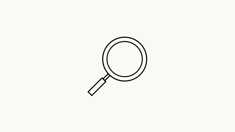 The image shows a simple magnifying glass icon with a circular lens and a short handle, symbolizing search or investigation.