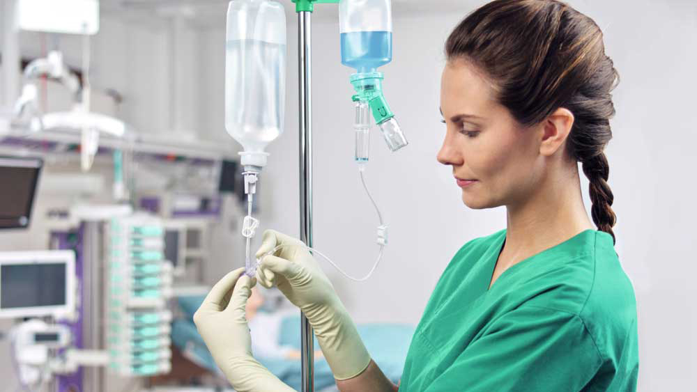 nurse checks intrafix safeset flush