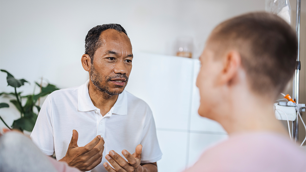 Medical professional talks to the patient